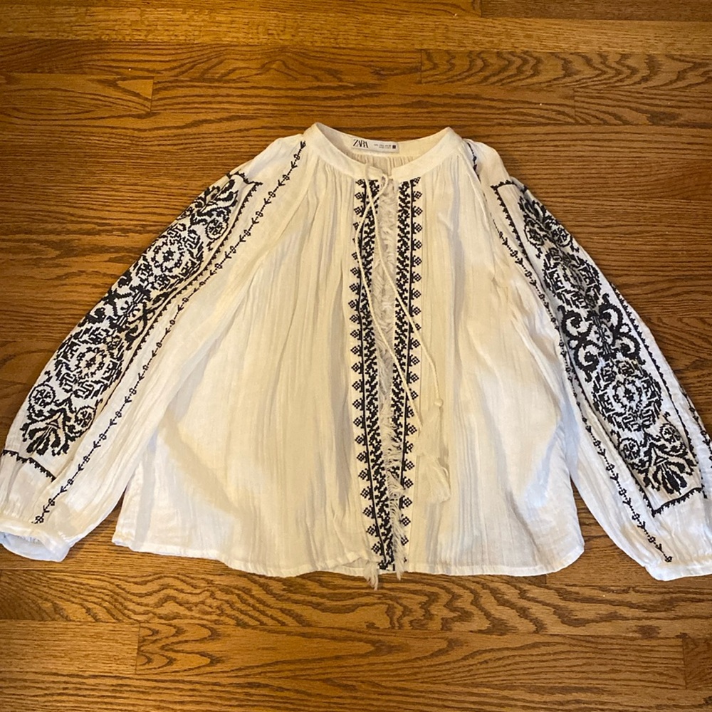 Zara open front flowy top with tassel detail.